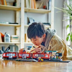 LEGO® City Downtown Tram and Station (811 pcs) Buildable Playset with 6 Minifigures and a Guide Dog Figure, Toy for Kids and Train Fans Aged 7+ 60423